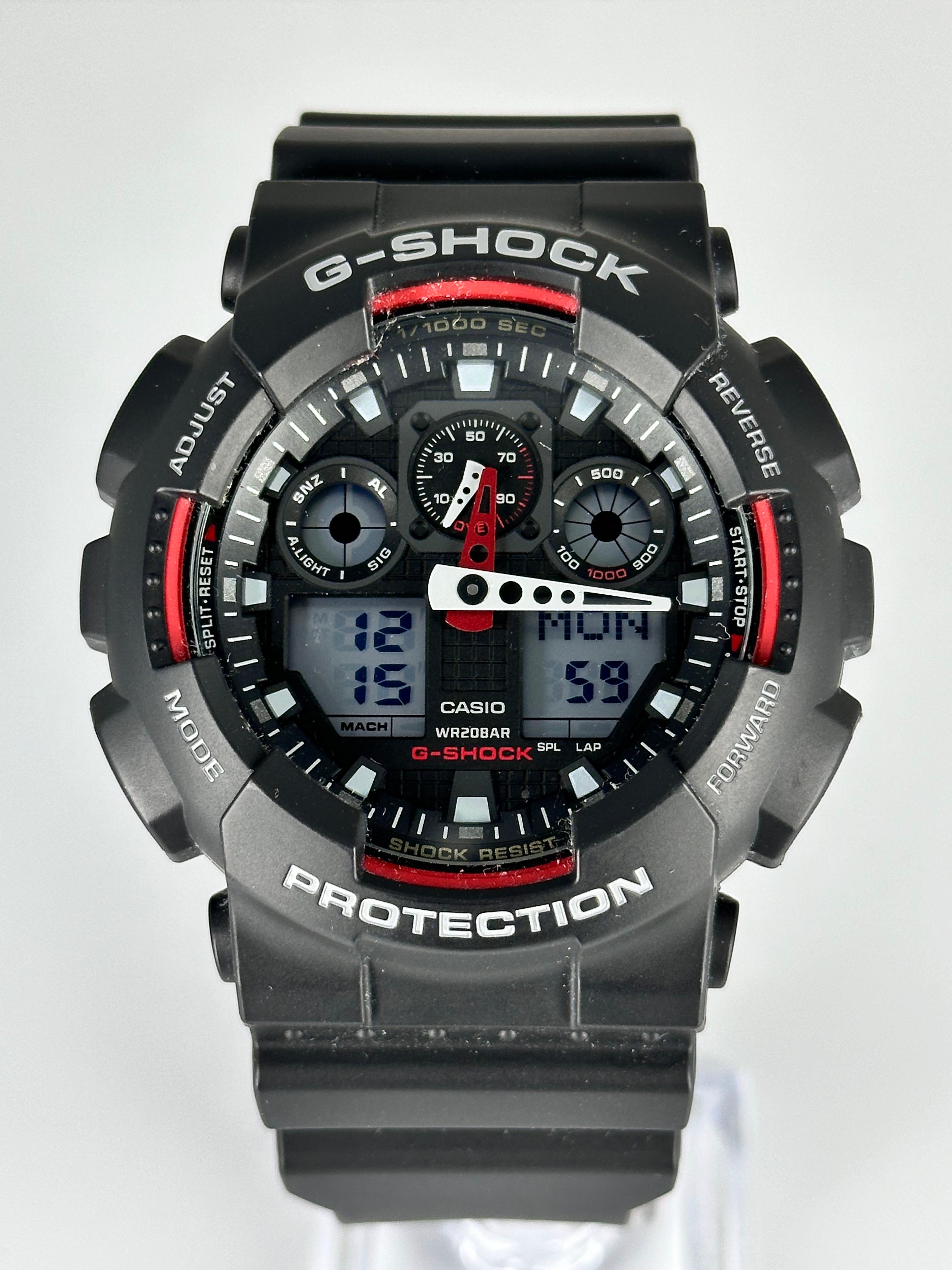 CASIO G Shock Analog Digital Watch with Three Eyes Black GA100 1A4 Bezel House